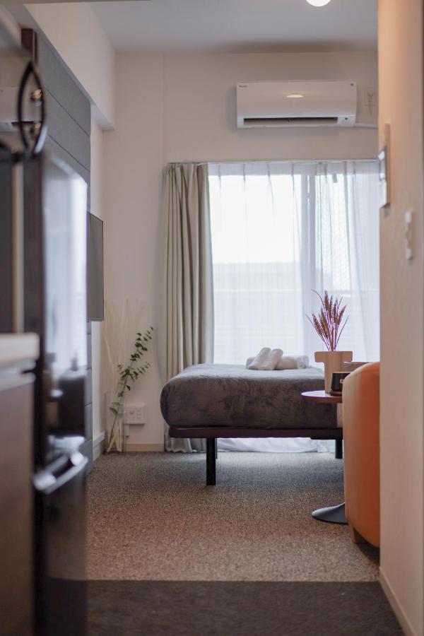 Apartment Hotel 11 Namba-Minami Ebisucho-Eki Mae Osaka Bagian luar foto